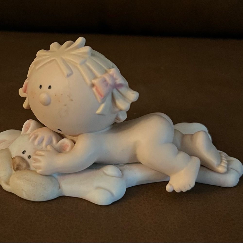 Bumpkins Baby Girl Laying on a Bear Rug Figurine